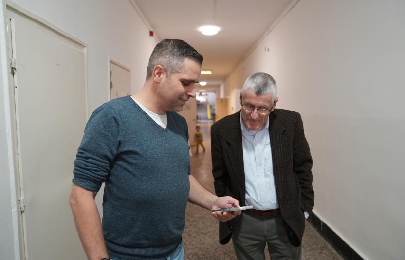 Two men in a refugee center in Budapest.