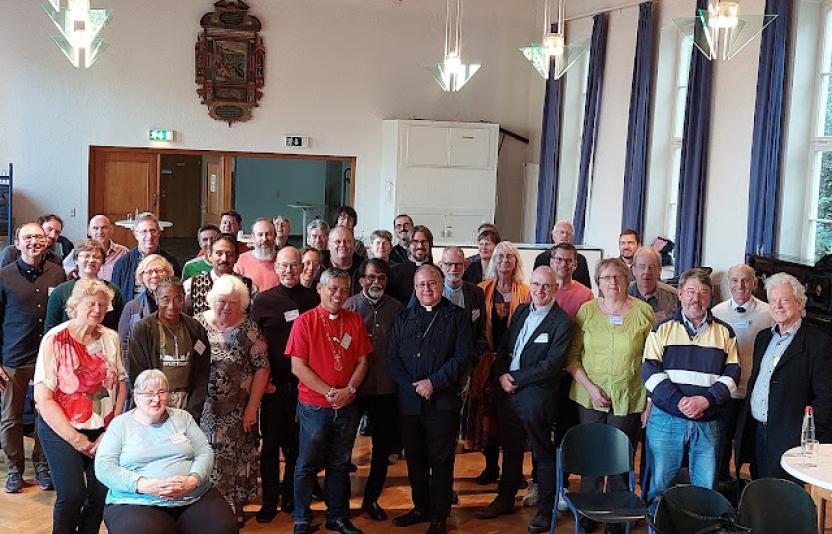 Clergy and lay synod delegates from the Diocese.