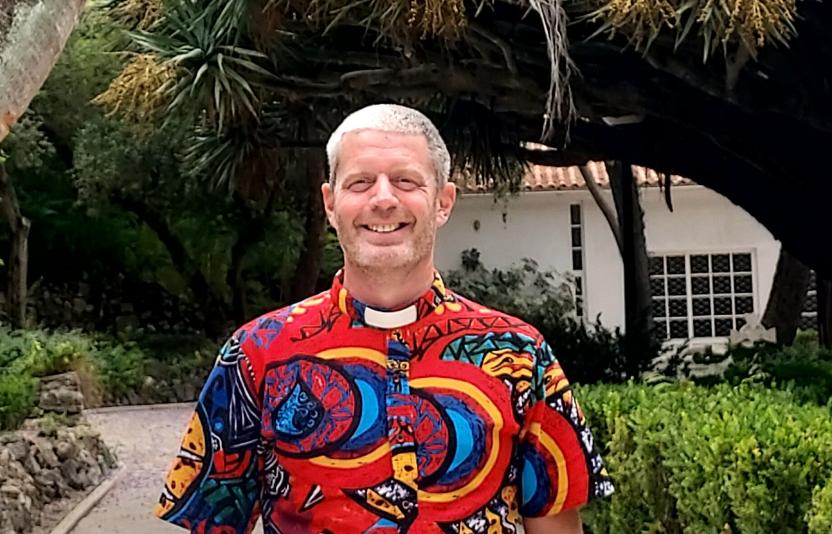 Ian in a bright shirt