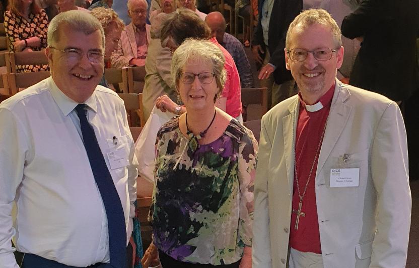 Bishop Robert joins ICS to cut their birthday cake to celebrate 200 years of ICS
