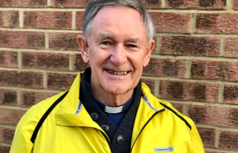 man in yellow jacket
