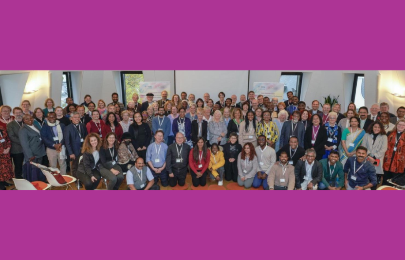group shot of participants at a conference