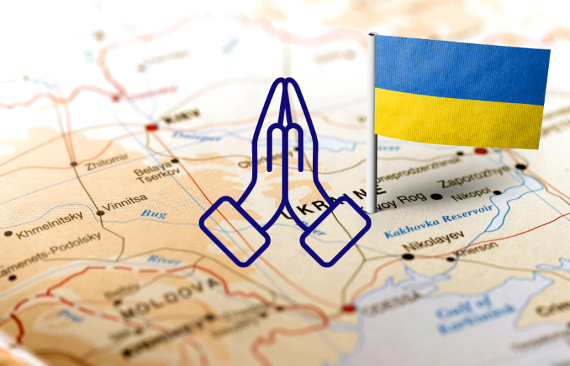 map of Ukraine with Ukraine flag and praying hands