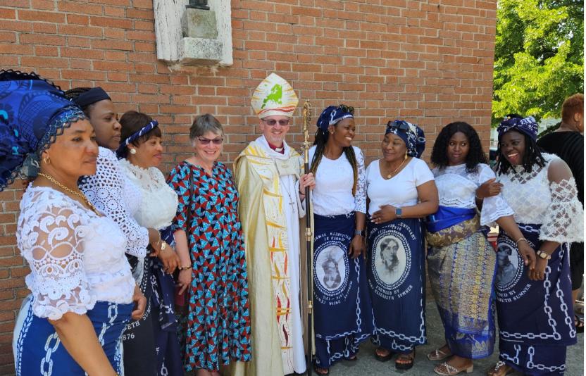 Bishop Robert and Mothers Union representatives in a row
