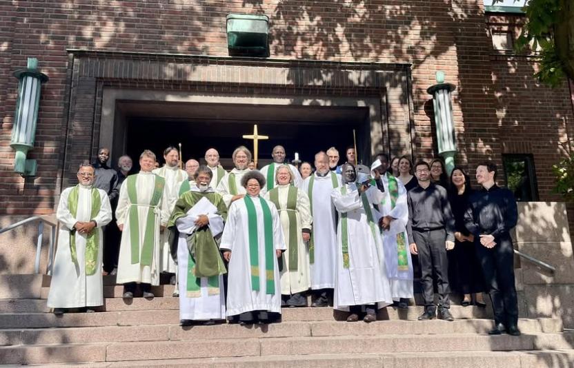 clergy outside a church in finland