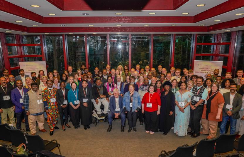 large group of people looking to camera