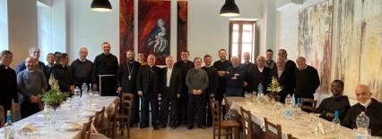 The Roman Catholic Archdiocese of Palermo sharing a meal with Bishop David.