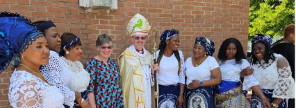 Bishop Robert and Mothers Union representatives in a row