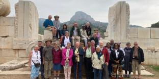 group in Turkey sat in a wall