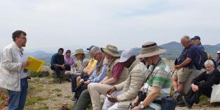 Revd James talking to group of people