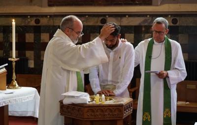 An adult baptism.