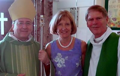 A picture of Reverend Canon Ben Eaton and others.