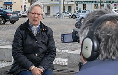 Debbie sat infront of a news camera.