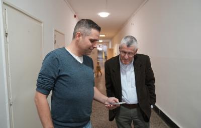 Two men in a refugee center in Budapest.