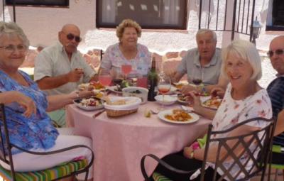 Members of the Costa Blanca Anglican chaplaincy enjoying a meal.