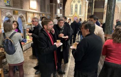 Clergy gathered after Chrism Mass.