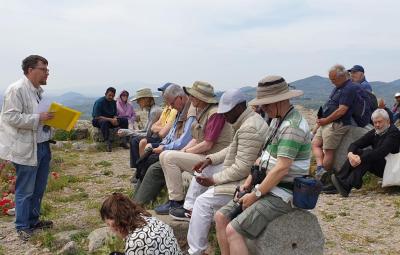 Revd James talking to group of people