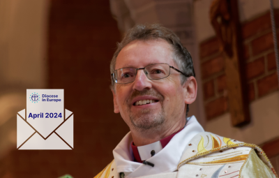 Portrait of Bishop Robert and a letter icon