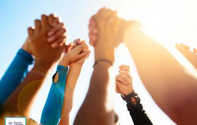 arms in the air display of unity