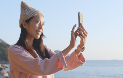 A woman looking at her phone