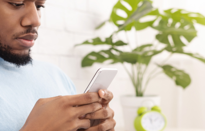 man looking at phone