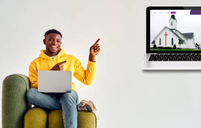 man points at computer