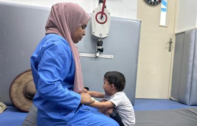 Nurse and small child